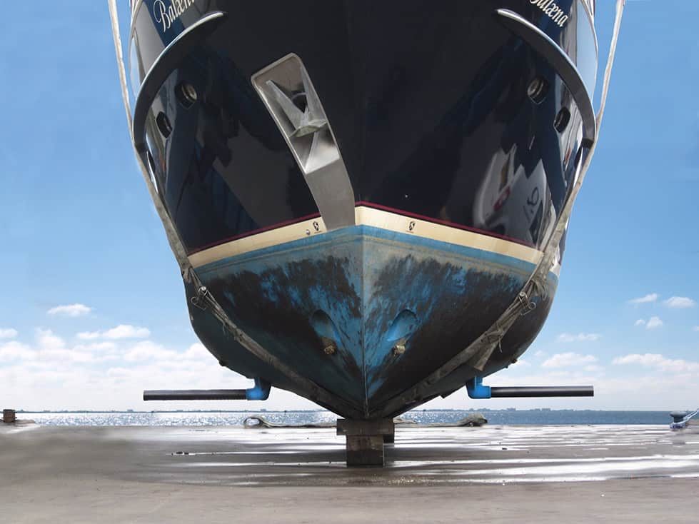 Hull of RotorSwing's GRP test vessel lifted above the water