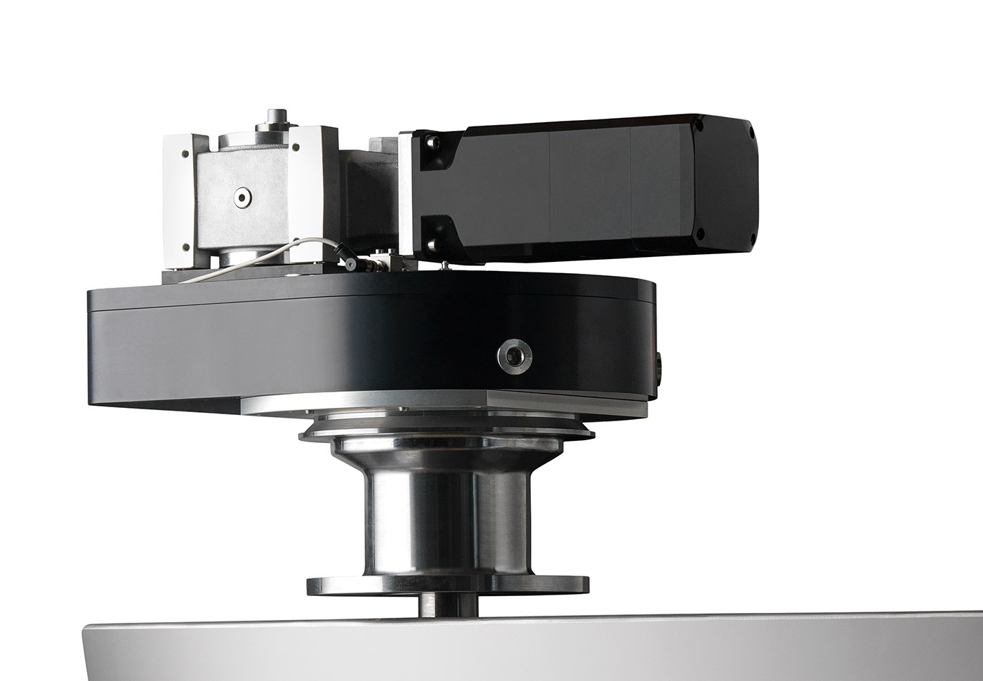 Close view of the RS E10 drive head: the black rotation housing, the in-house gearbox and electric motor, and the polished stainless shaft flange above the blade