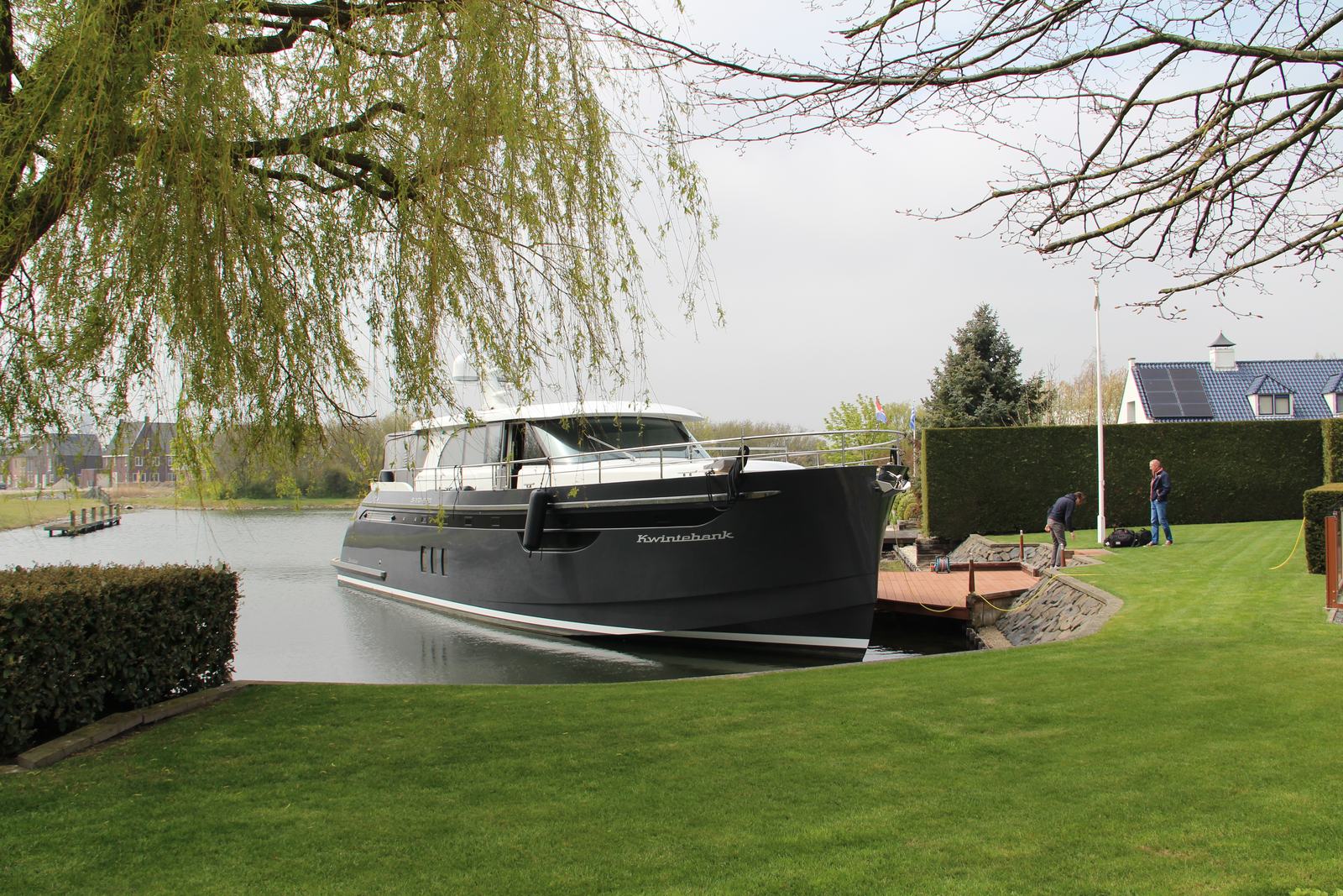 A dark-hulled Steeler moored at its owner’s private jetty on a spring morning