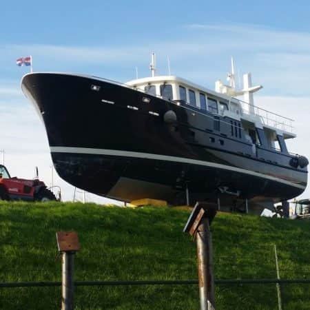 MY Soeticheyt standing ashore beside the yard buildings